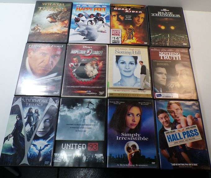 12 Mixed Genre DVDs in Standard Cases - Auction Ohio