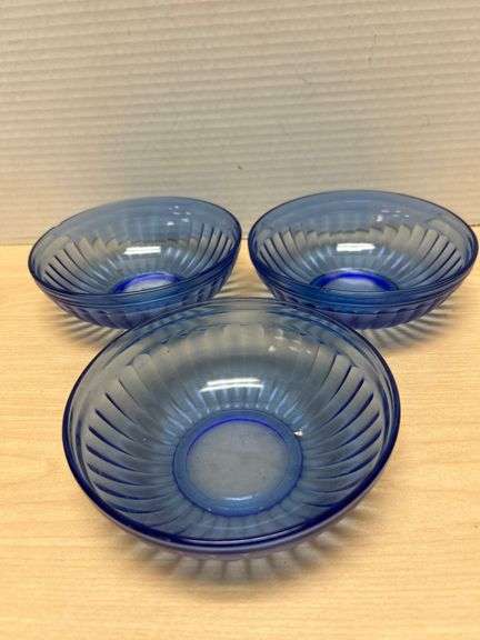 Three Blue Glass Bowls with Ribbed Design and Visible Rim Chips ...