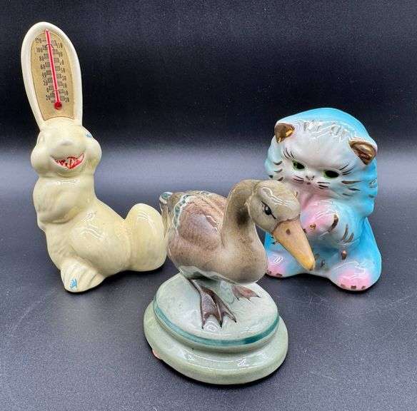 Three Ceramic Figurines Including Rabbit Thermometer, Swan, and Blue Cat