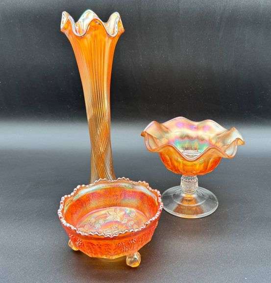 Three Carnival Glass Pieces Including Fenton Vase, Imperial Candy Dish, and Dugan Compote