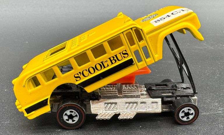Hot Wheels ‘S’Cool Bus’ Die-Cast Model in Yellow with Exposed Engine Details