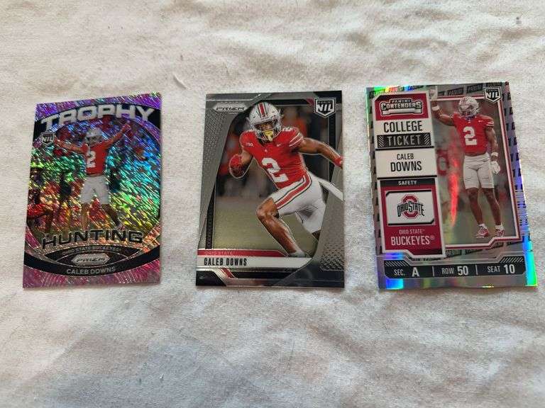 Lot of three silver foil prizm Caleb Downs football cards.