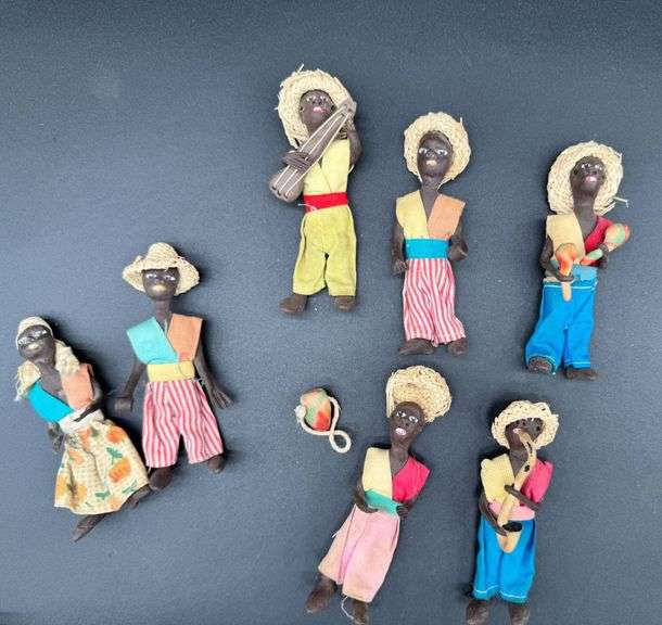 Seven Folk Art Fabric Dolls in Vibrant Attire with Accessories