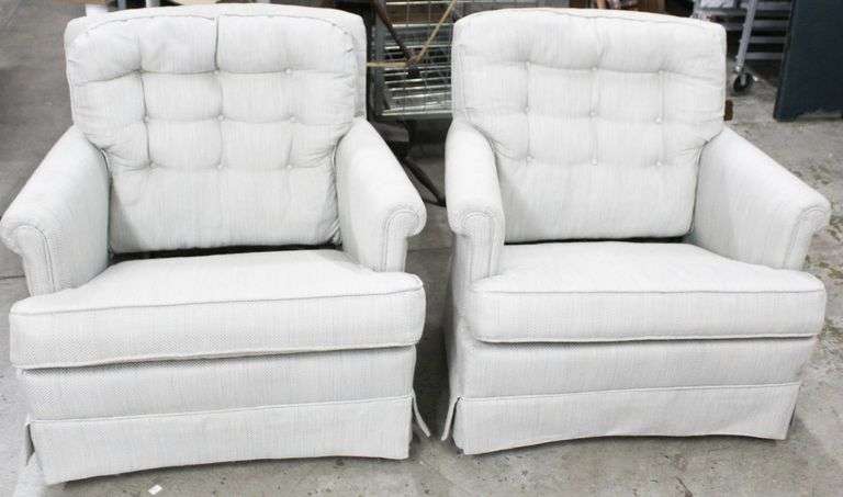 UPHOLSTERED ARMCHAIRS WITH BUTTON-TUFTED BACKRESTS.