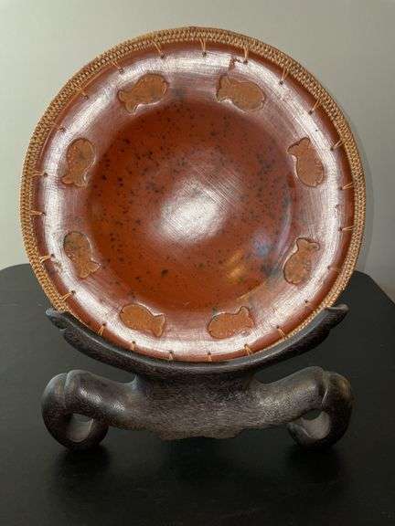 Rattan wrapped pottery bowl