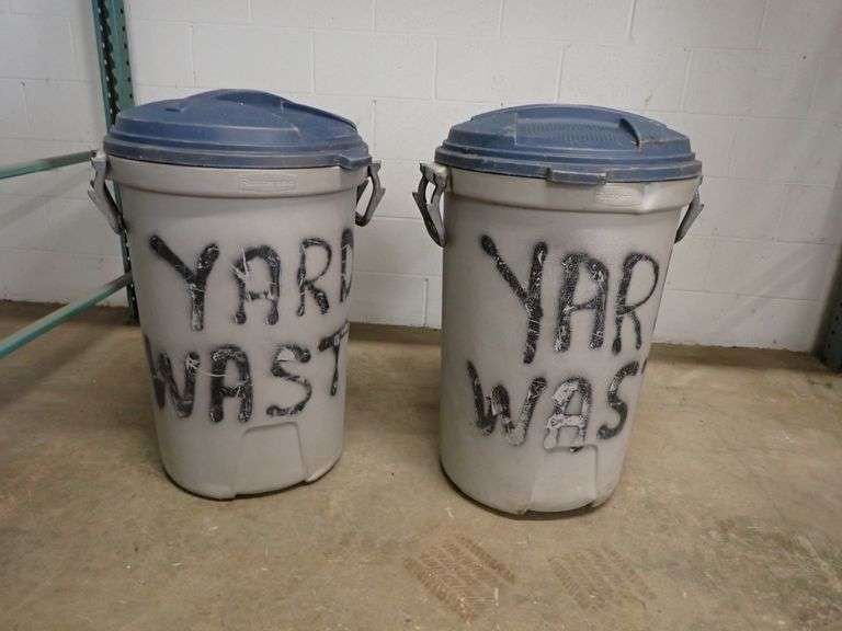 TWO RUBBERMAID ROUGHNECK 50 GALLON CANS WITH LIDS