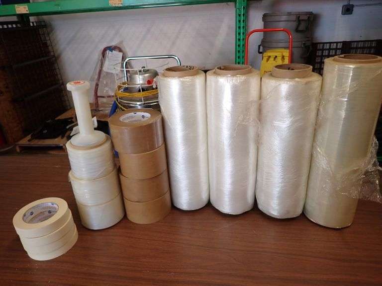 ROLLS OF PLASTIC AND TAPE