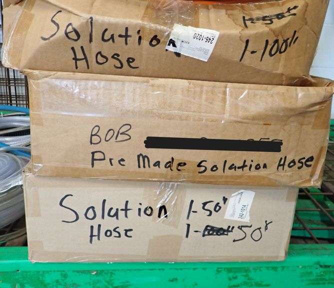 THREE BOXES FILLED WITH SOLUTION HOSES NEW OR IN VERY GOOD CONDITION