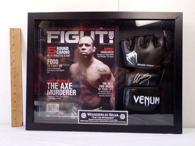 Shadowbox filled with Wonderlei Silva's Autographed Boxing Glove & Magazine