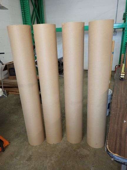FOUR 50"X8" THICK CARDBOARD ROUND TUBES