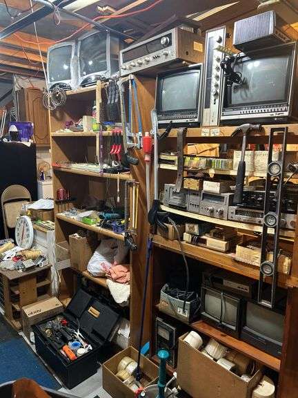 Contents of shelf(shelf exc)monitors, staple guns, realistic components, tape, tools,octagonal table