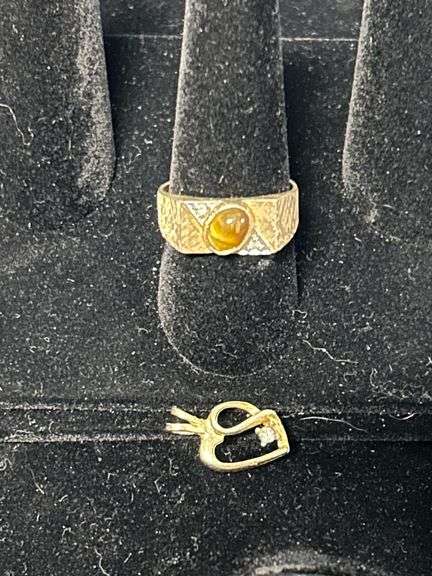 10k Gold men’s ring (4.8grams) & unmarked pendant