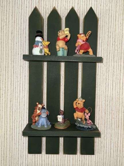 Shelf With Small Disney Figurines
