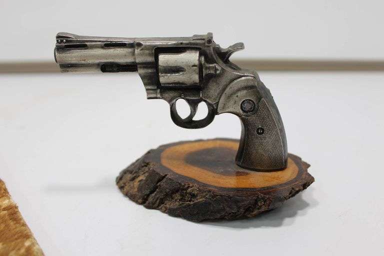 Decorative Metal Revolver with Wooden Base and Leather Holster Whip Accessory