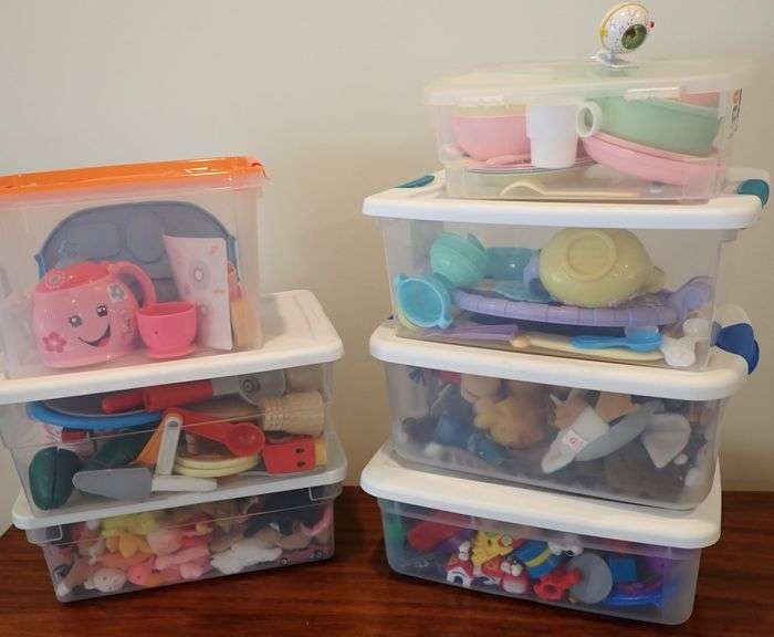 7 totes filled with clean toys