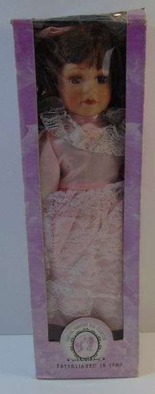 Collectible Fine Bisque Porcelain Doll with Pink Dress