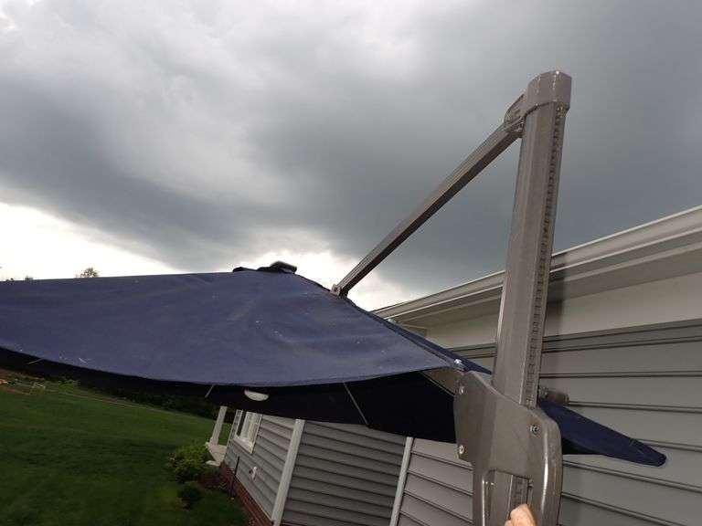 Large Cantilever Umbrella with weights.  Ready for spring