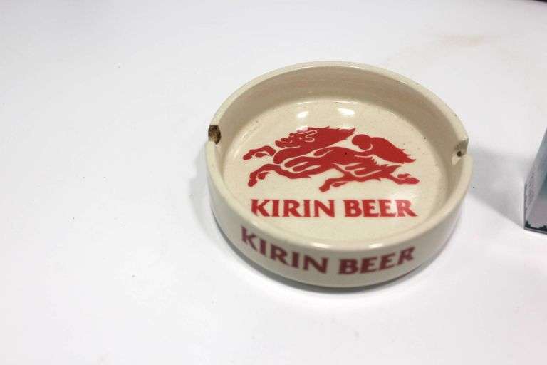 Kirin Beer Ashtray, American Spirit Cigarette Tin, and Pin-Up Style Ceramic Mugs Lot