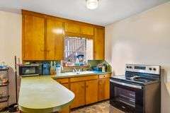 Multiple Property Real Estate Auction - 4 Unit Apartment, 6 Unit Apartment, 3 Vacant Lots