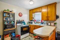 Multiple Property Real Estate Auction - 4 Unit Apartment, 6 Unit Apartment, 3 Vacant Lots