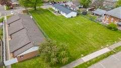 Multiple Property Real Estate Auction - 4 Unit Apartment, 6 Unit Apartment, 3 Vacant Lots