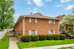 Multiple Property Real Estate Auction - 4 Unit Apartment, 6 Unit Apartment, 3 Vacant Lots