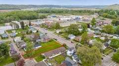 Multiple Property Real Estate Auction - 4 Unit Apartment, 6 Unit Apartment, 3 Vacant Lots