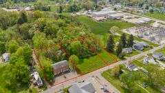 Multiple Property Real Estate Auction - 4 Unit Apartment, 6 Unit Apartment, 3 Vacant Lots
