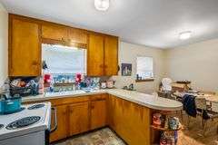 Multiple Property Real Estate Auction - 4 Unit Apartment, 6 Unit Apartment, 3 Vacant Lots