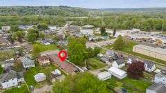 Multiple Property Real Estate Auction - 4 Unit Apartment, 6 Unit Apartment, 3 Vacant Lots