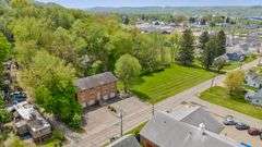 Multiple Property Real Estate Auction - 4 Unit Apartment, 6 Unit Apartment, 3 Vacant Lots