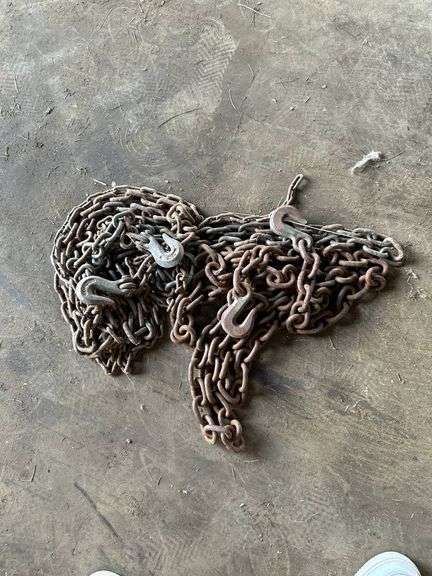 Rusty Metal Chains with Hooks for Utility or Industrial Use