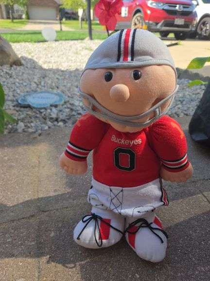 OSU Football player on stand