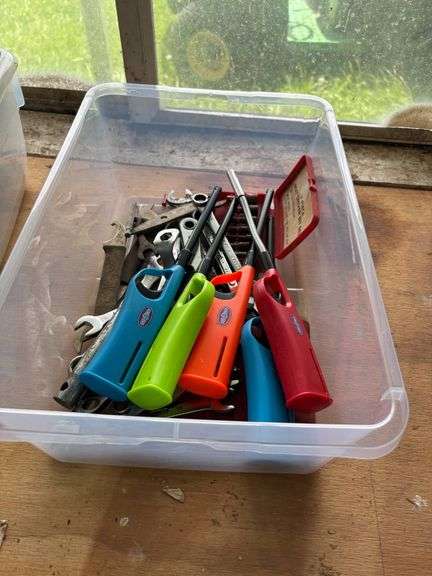 Plastic Bin with Utility Lighters, Wrenches, and 7-Piece Nut Driver Bit Set