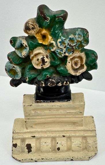 Antique Cast Iron Doorstop with Floral Bouquet Design