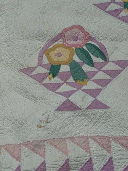Handmade Pink and White Floral Basket Quilt with Triangular Border Design
