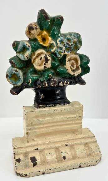 Antique Cast Iron Doorstop with Floral Bouquet Design