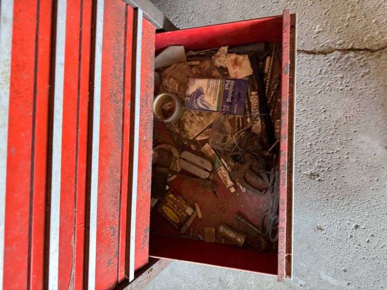 Red Metal Tool Chest with Multiple Drawers and Contents
