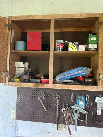 Wooden Wall-Mounted Storage Cabinet With Automotive and Workshop Supplies