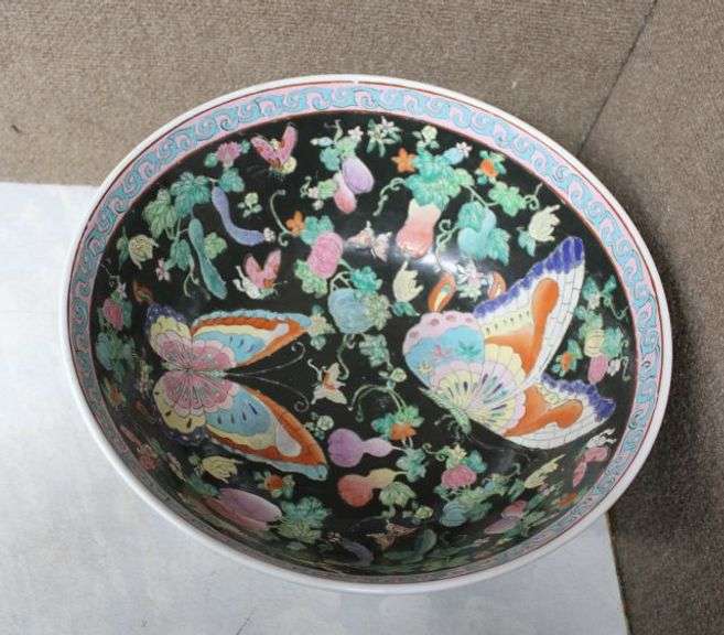 Porcelain Bowl with Black Background, Butterfly Motif, and Wooden Stand