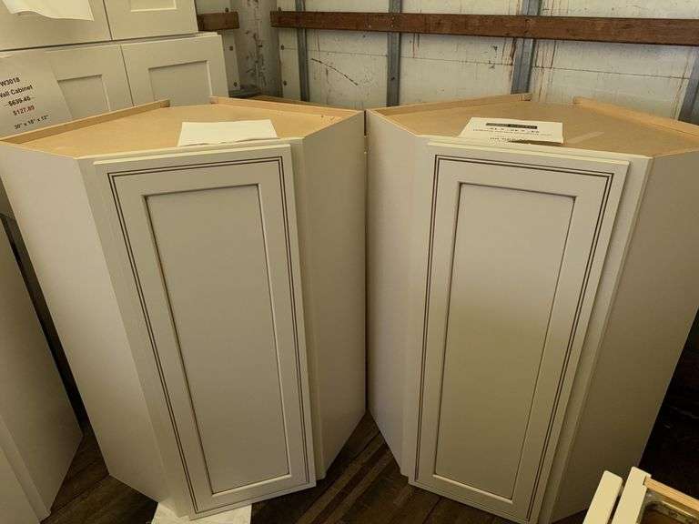 Grouping of two wall diagonal corner cabinet