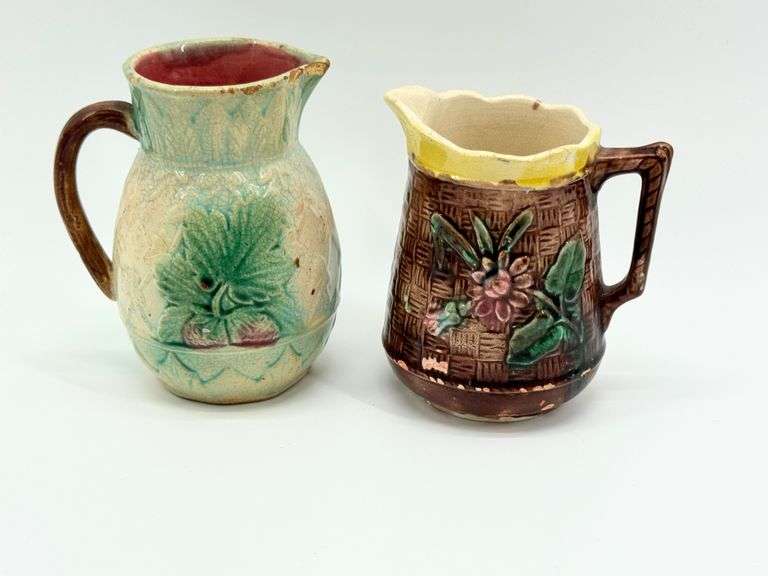 Two Victorian Majolica Cream Pitchers with Floral and Botanical Designs