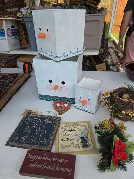 Snowman nesting boxes and signs