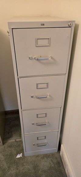 Grey metal filing cabinet