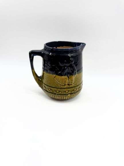 Two-Tone Glazed Ceramic Pitcher with Relief Design