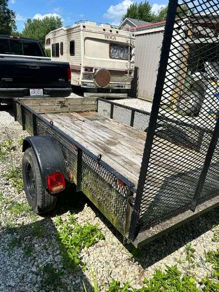 Utility Trailer with Mesh Sides and Fold-Down Ramp - Auction Ohio