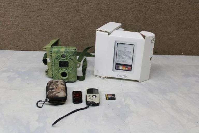 Spypoint 211 Trail Camera, Kodak Playsport Waterproof Camera, Remote, Battery, and Nook E-Reader Bun