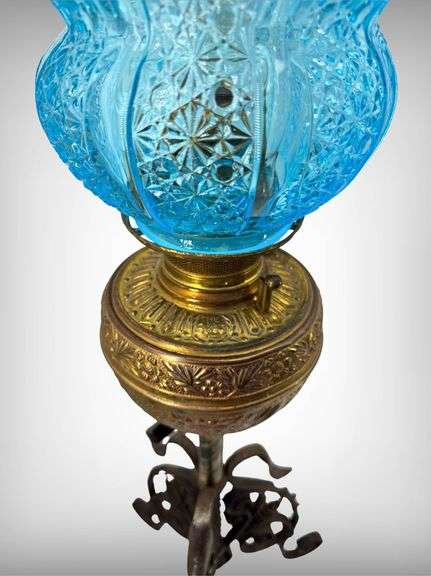 Antique Brass Victorian-Style Oil Lamp with Blue Daisy and Button Glass Shade and Wrought Iron Base