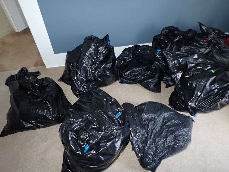 EIGHT BAGS FILLED WITH CLEAN FOLDED UNSEARCHED CLOTHING - MENS & WOMENS.