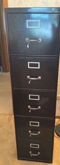 Four Drawer File Cabinet ￼